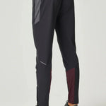 Men wearing burgundy and obsidian Reprimo Impact Pants with dual-fabric paneling and ergonomic fit