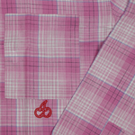 Close-up of Cherry Location Pink Shirt with pink plaid pattern and red cherry embroidery on pocket