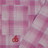 Close-up of Cherry Location Pink Shirt with pink plaid pattern and red cherry embroidery on pocket