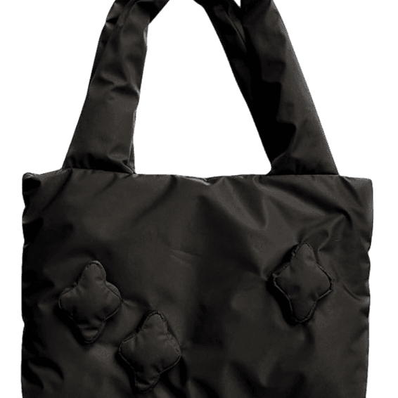 Broken Planet Puffer Star Tote Bag in black with star details.