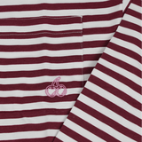 Close-up of Cherry Location OG Stripe T-Shirt with maroon and white stripes and cherry embroidery on pocket