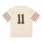 Cream Supreme Studded short-sleeve top SS26 with stud detailing