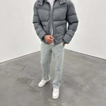 Siarr Lightweight Jacket in Green Slate with detachable hood and zip pockets.
