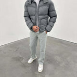 Siarr Lightweight Jacket in Green Slate with detachable hood and zip pockets.