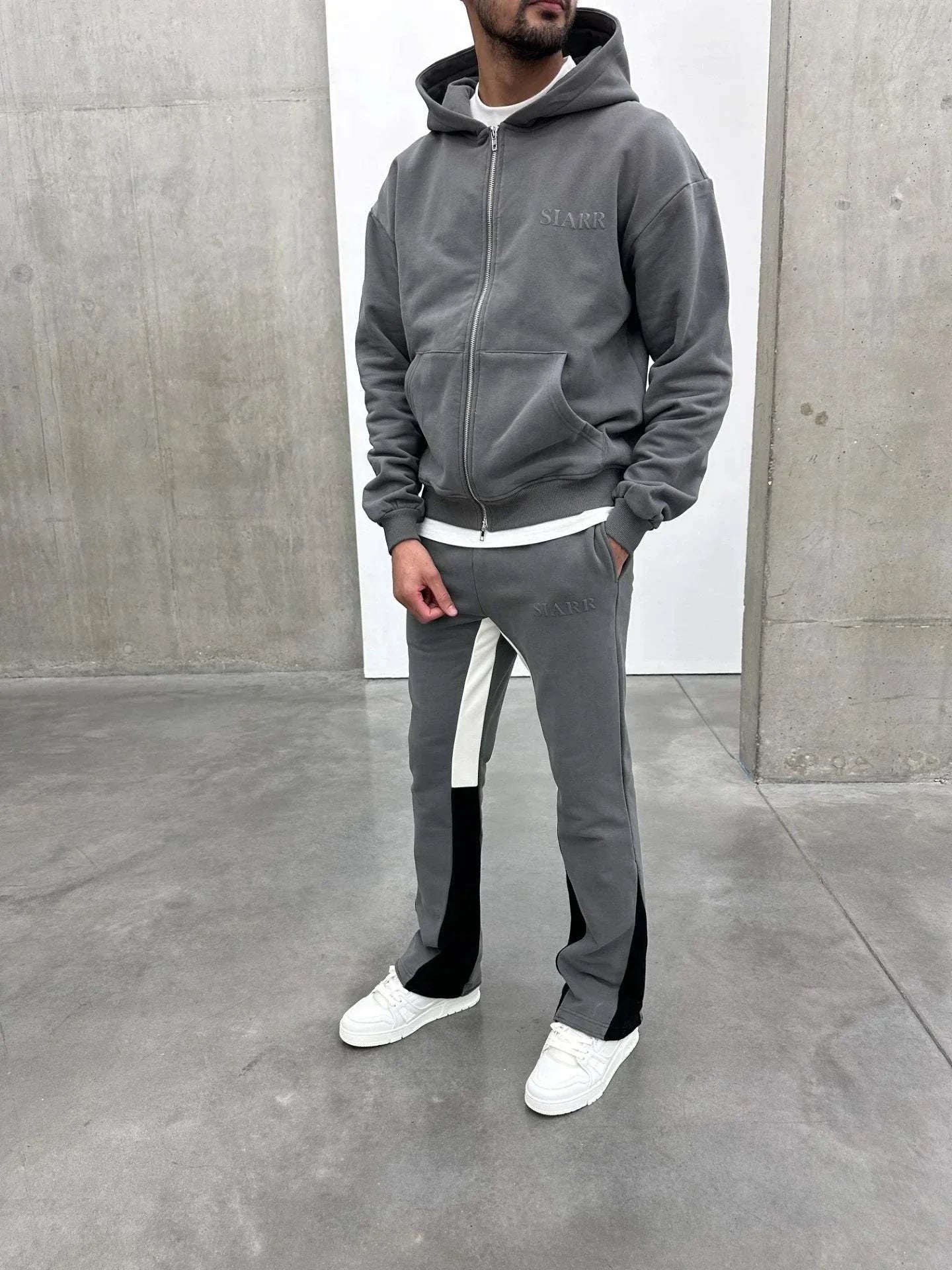 Siarr Zip Hoodie dark grey full zip cotton hoodie with kangaroo pocket and puff print logo