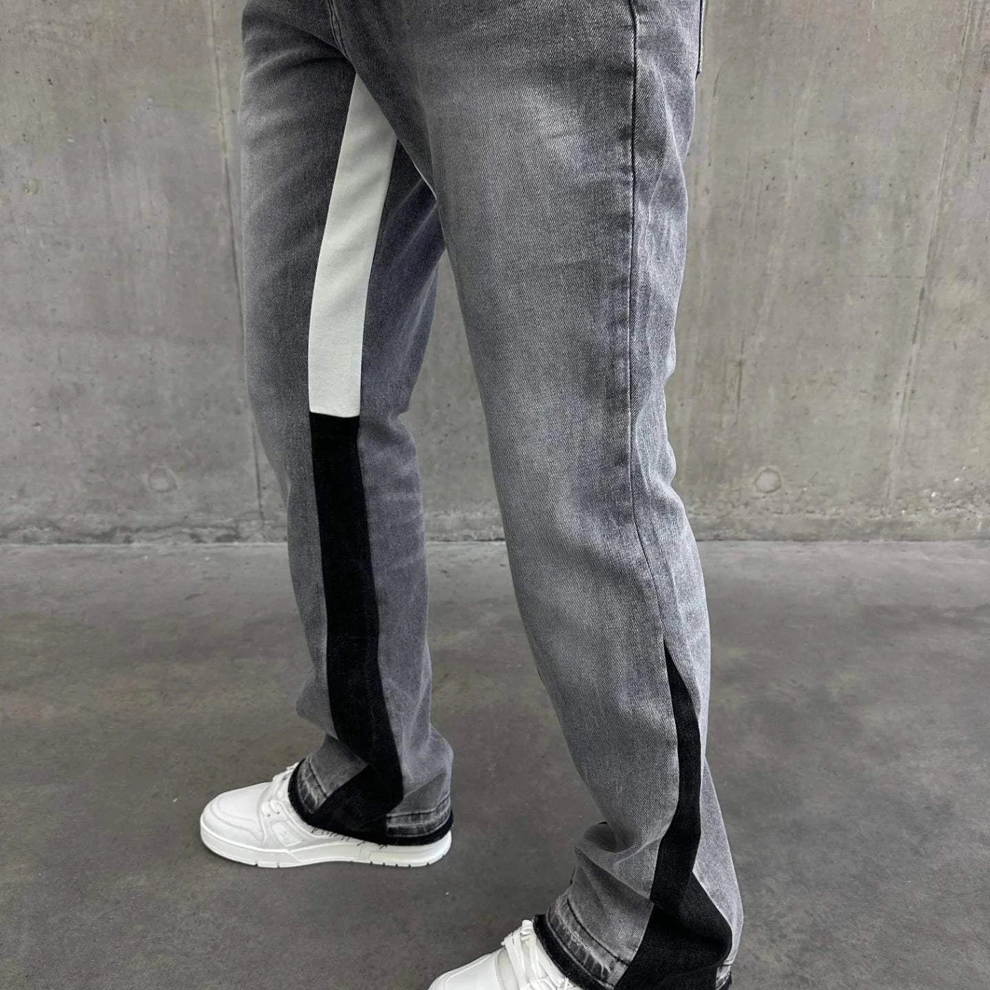 Siarr Flared Jeans light grey denim with black contrast inner seam and hem, slim flared fit with multiple pockets