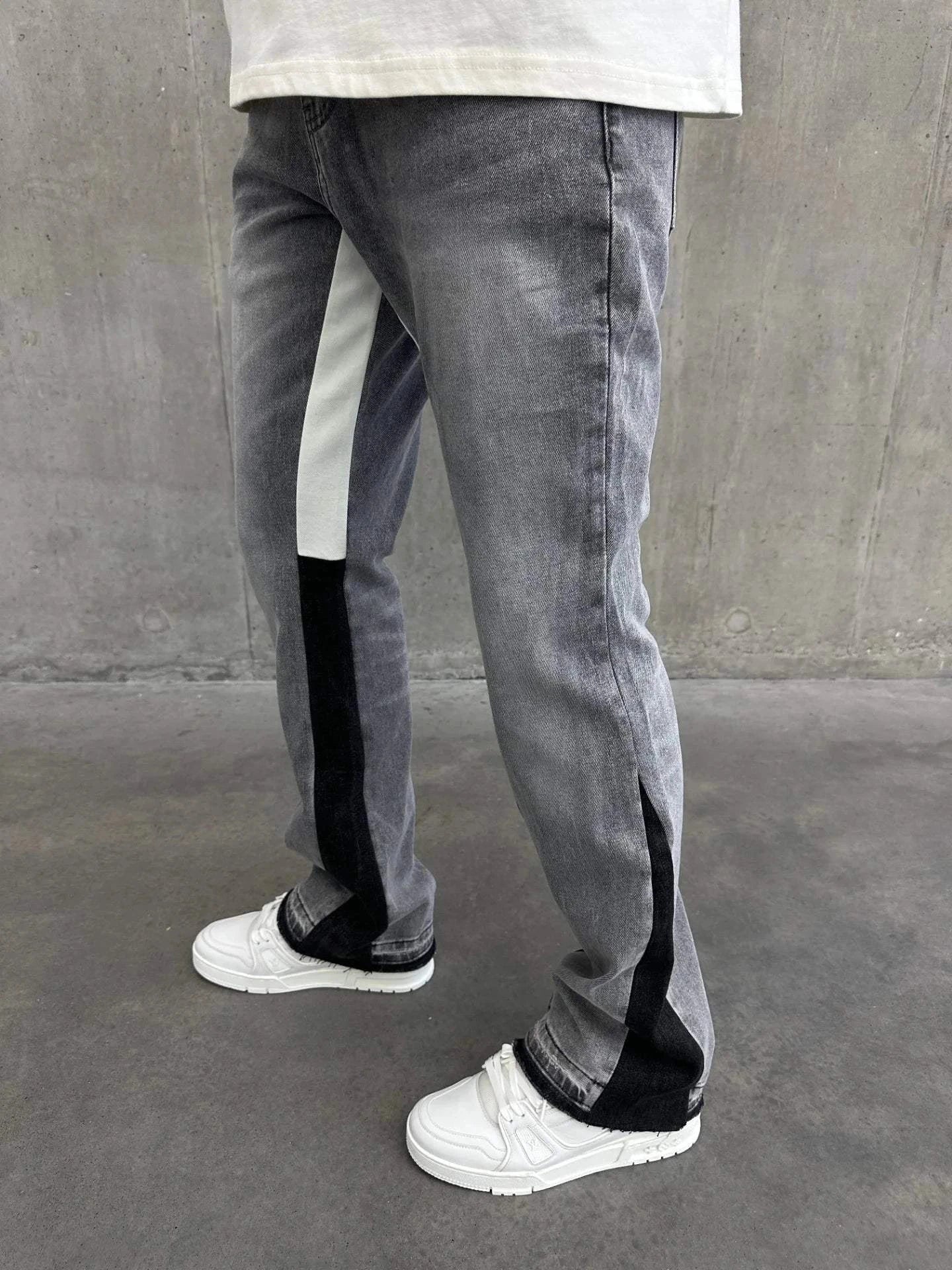 Siarr Flared Jeans light grey denim with black contrast inner seam and hem, slim flared fit with multiple pockets