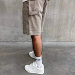 Siarr Rio Shorts Beige with raw hem and belt loops.