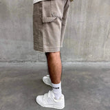 Siarr Rio Shorts Beige with raw hem and belt loops.