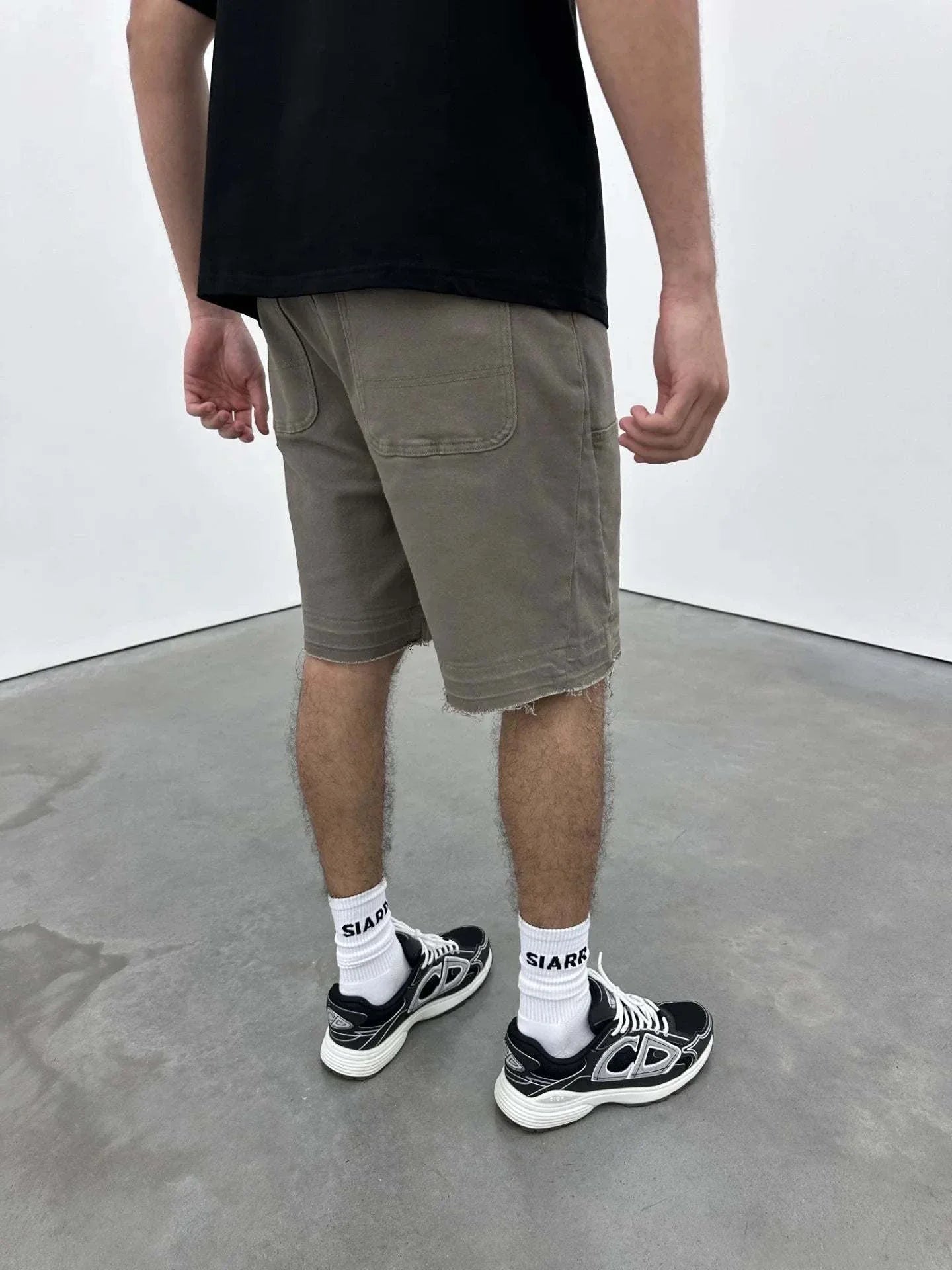 Siarr Rio Shorts Sage with raw hem and SIARR branded details