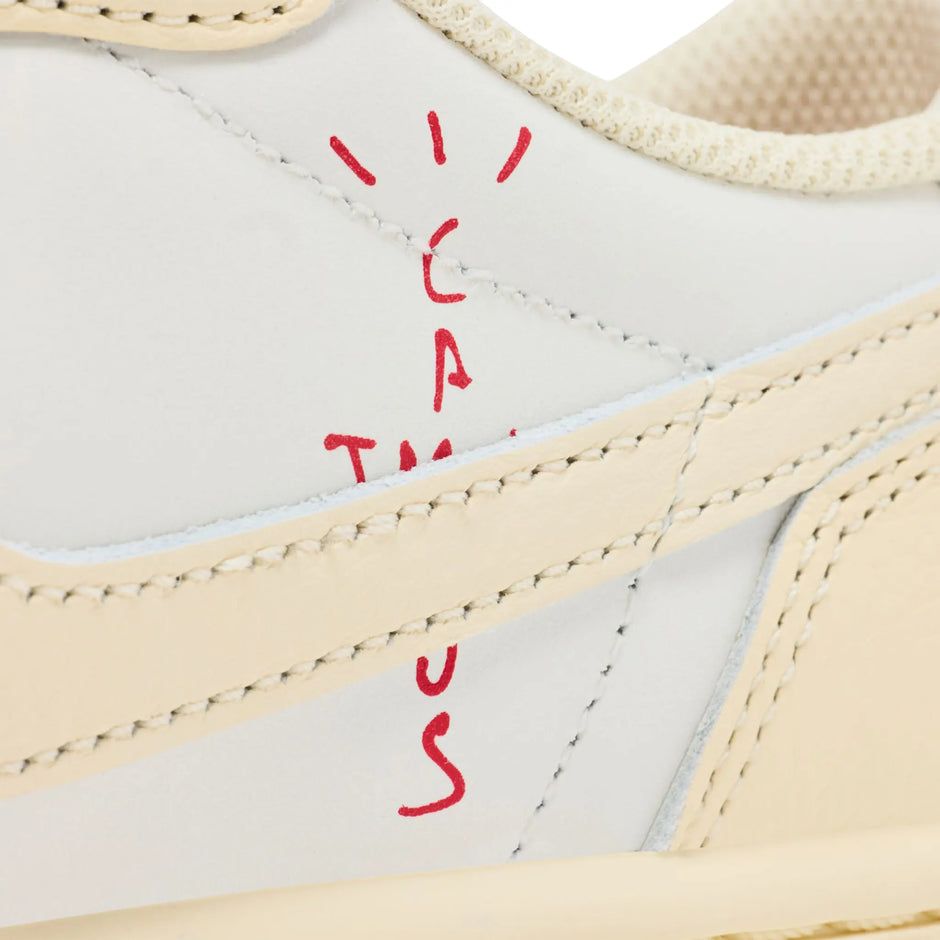 Travis Scott x Air Jordan 1 Retro Low OG Shy Pink sneaker with reverse Swoosh and Cactus Jack branding