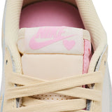 Travis Scott Air Jordan 1 Retro Low OG Shy Pink sneaker with reverse Swoosh and Cactus Jack branding