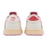 Travis Scott x Air Jordan 1 Retro Low OG Sail Tropical Pink sneaker with reverse Swoosh and vibrant pink accents