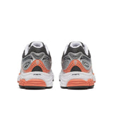 Saucony ProGrid Omni 9 running shoe in silver and orange colors