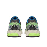Saucony ProGrid Omni 9 running shoes in grey and slime color