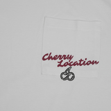 White t-shirt with Cherry Location text and cherry icon pocket design