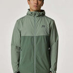 Reprimo Xcelerate Windbreaker in sage and botanical colors worn by a model.