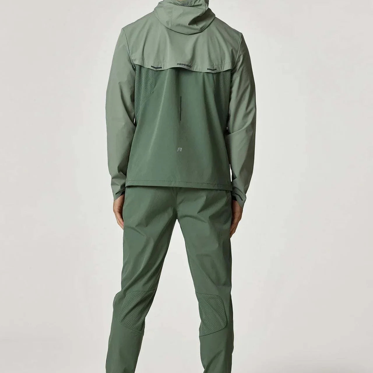 Reprimo Xcelerate Windbreaker in Sage/Botanical, back view.