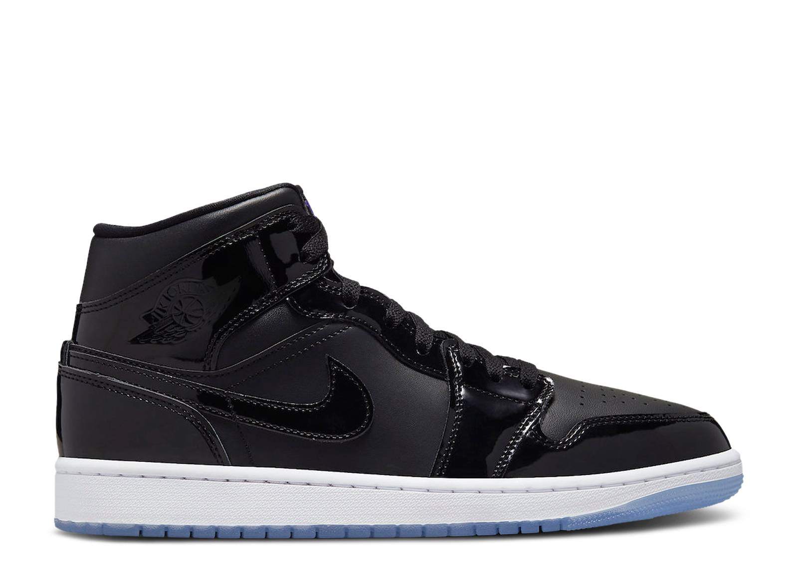 Air Jordan 1 Mid Space Jam sneaker in black with blue accents.