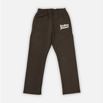 Dark brown sweatpants with "Broken Planet" logo on the front.