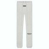 Fear of God Essentials light oatmeal sweatpants SS22.