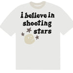 White t-shirt with "I believe in shooting stars" text, Broken Planet design.