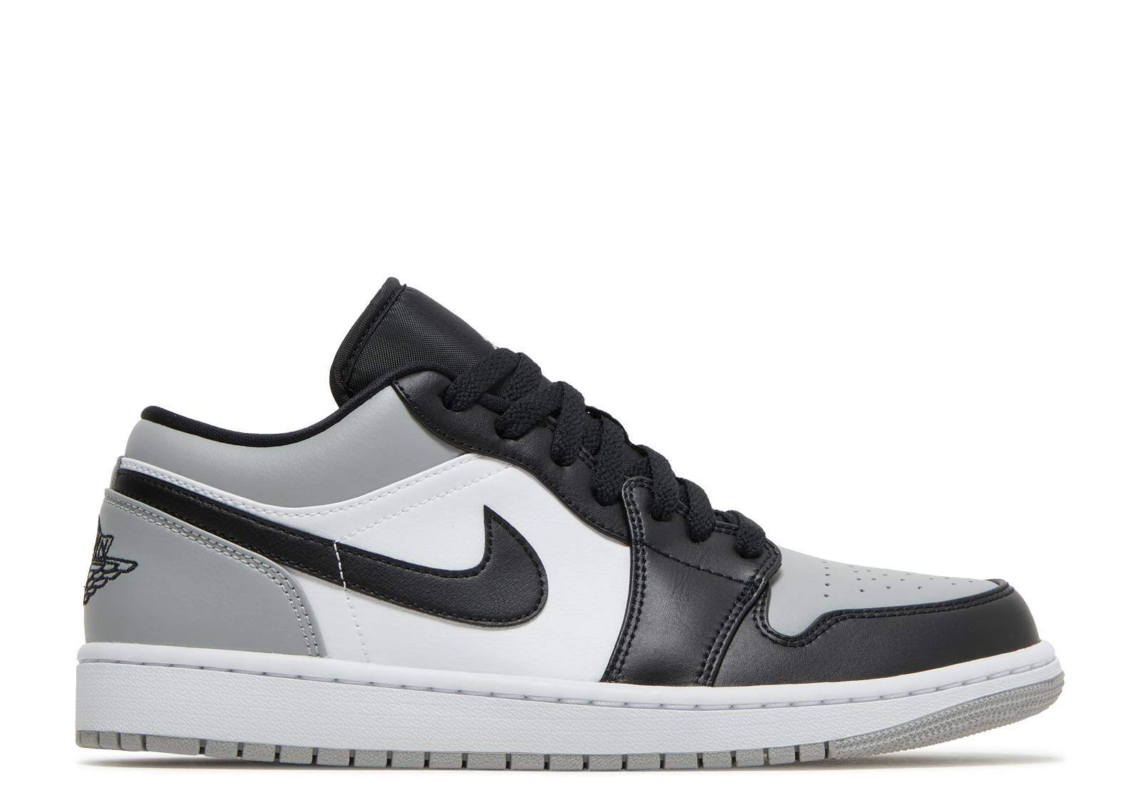 Air Jordan 1 Low Shadow Toe sneaker with black, white, and grey design.