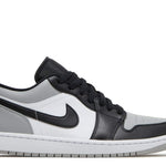 Air Jordan 1 Low Shadow Toe sneaker with black, white, and grey design.