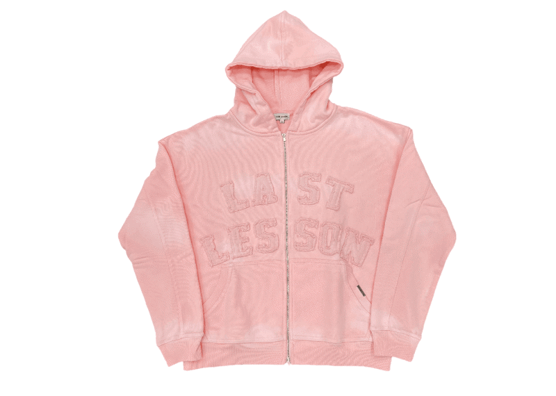 LAST LESSON pink Starboy hoodie with front zip and text design.