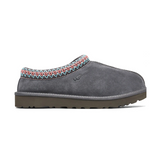 Dark grey UGG Tasman slipper with colorful trim.