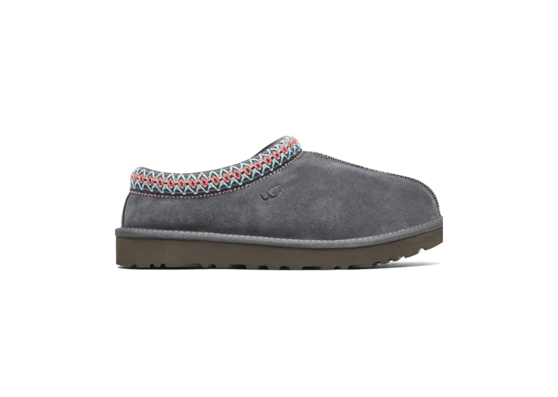 Dark grey UGG Tasman slipper with colorful trim.